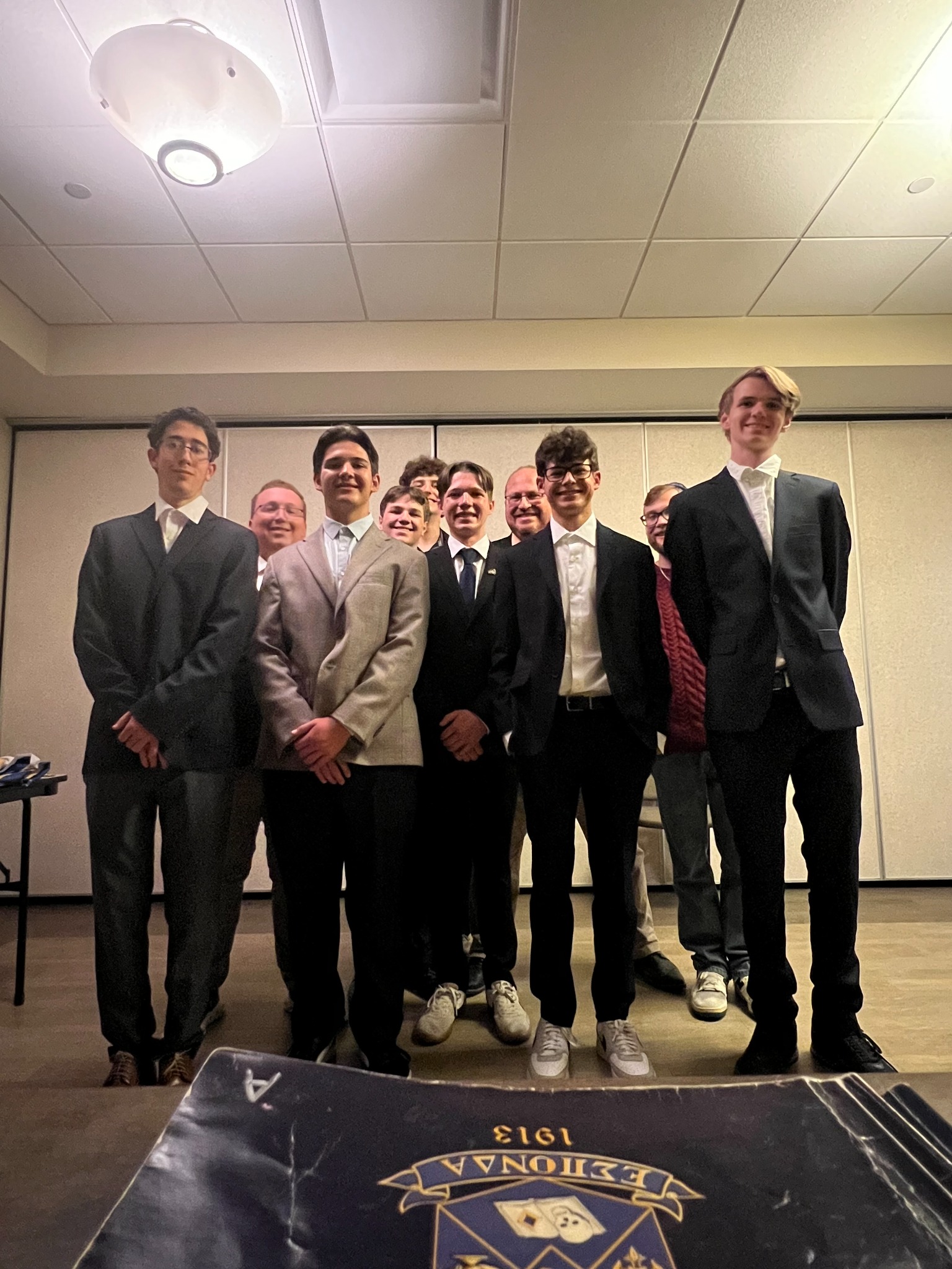Phi Deuteron brothers at a formal chapter event